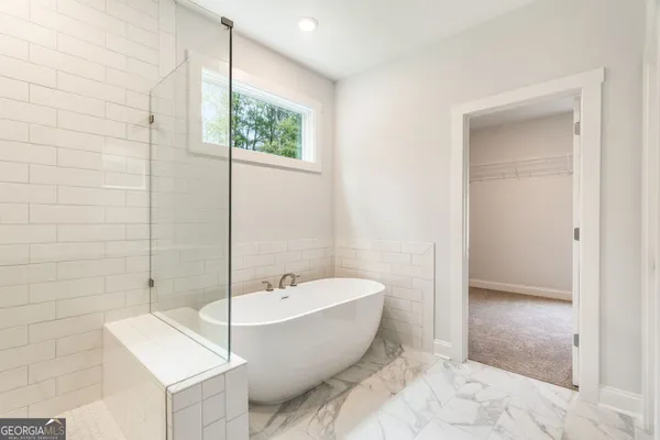 a view of a hallway with staircase