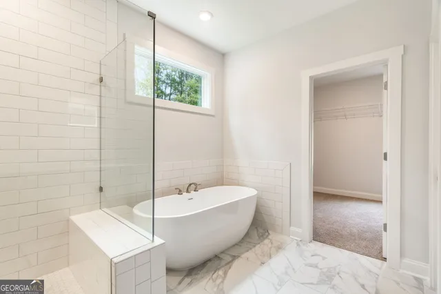 a view of a hallway with staircase