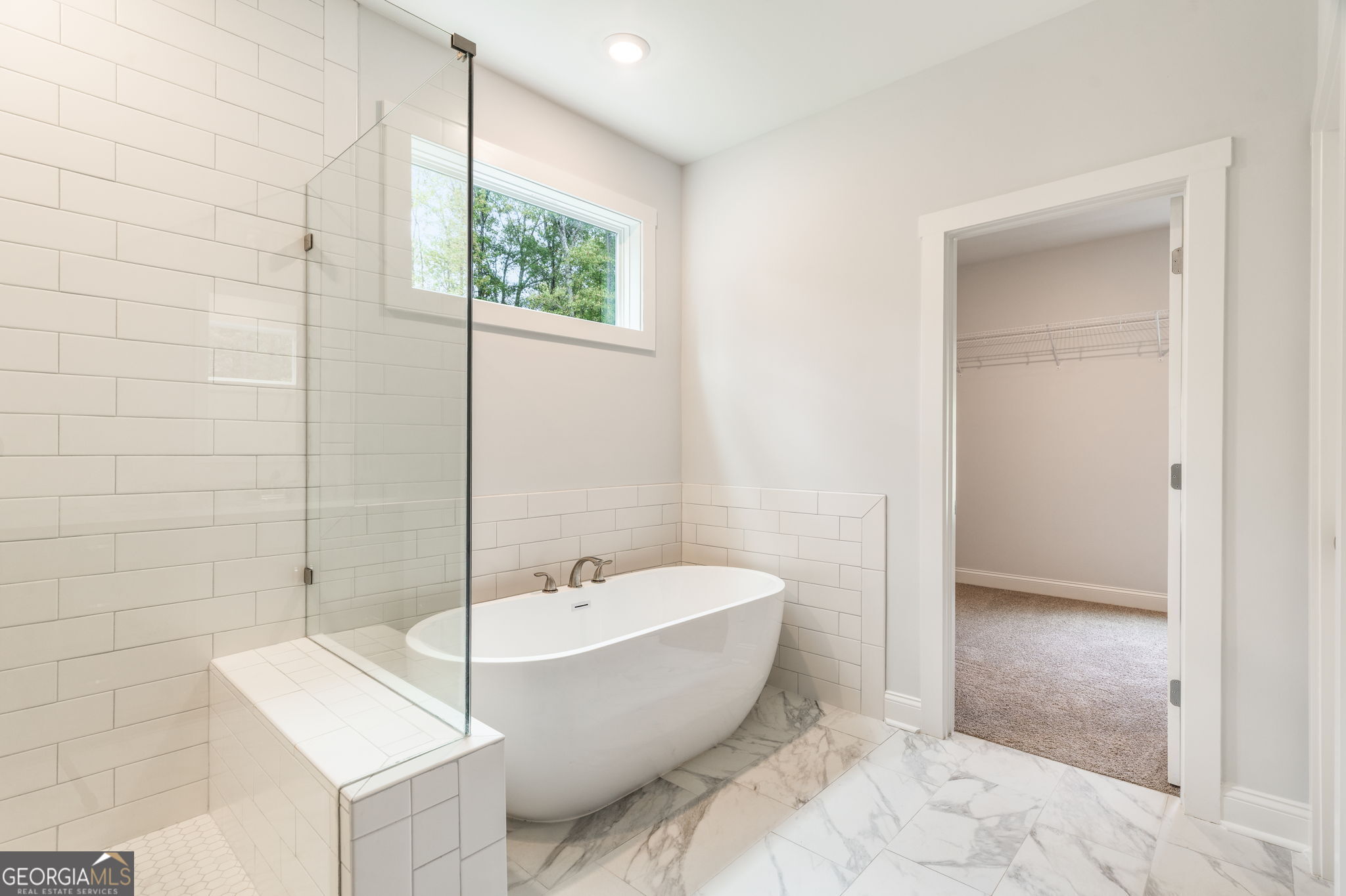 102 Mill Race Road Thomaston, GA 30286 - Photo 28 of 57 a white bath tub sitting next to a white sink