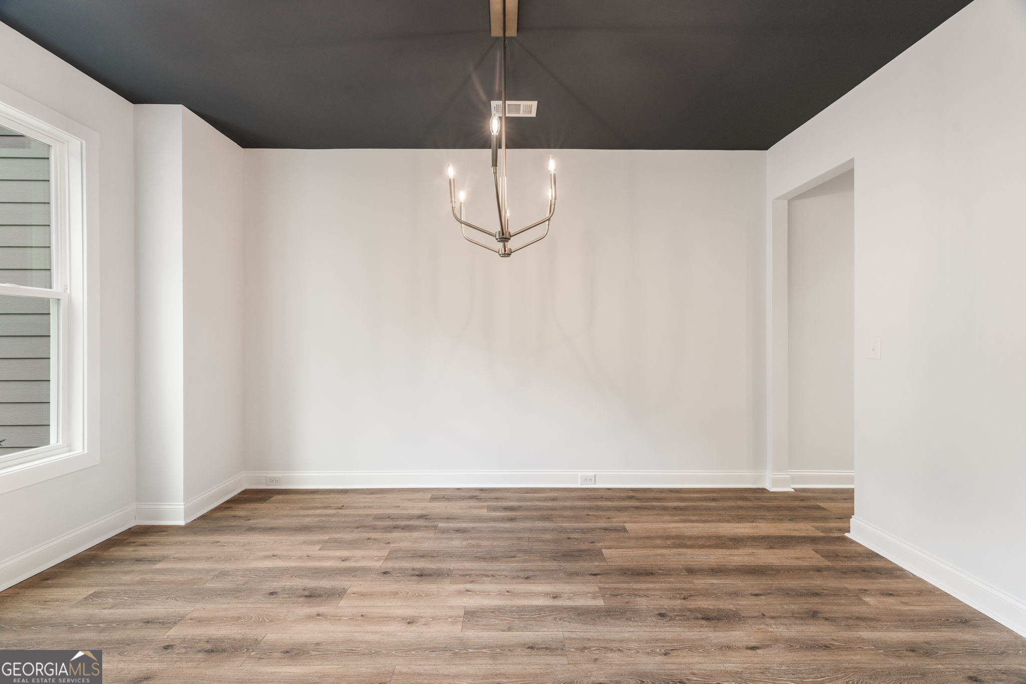102 Mill Race Road Thomaston, GA 30286 - Photo 4 of 57 a view of a room with wooden floor