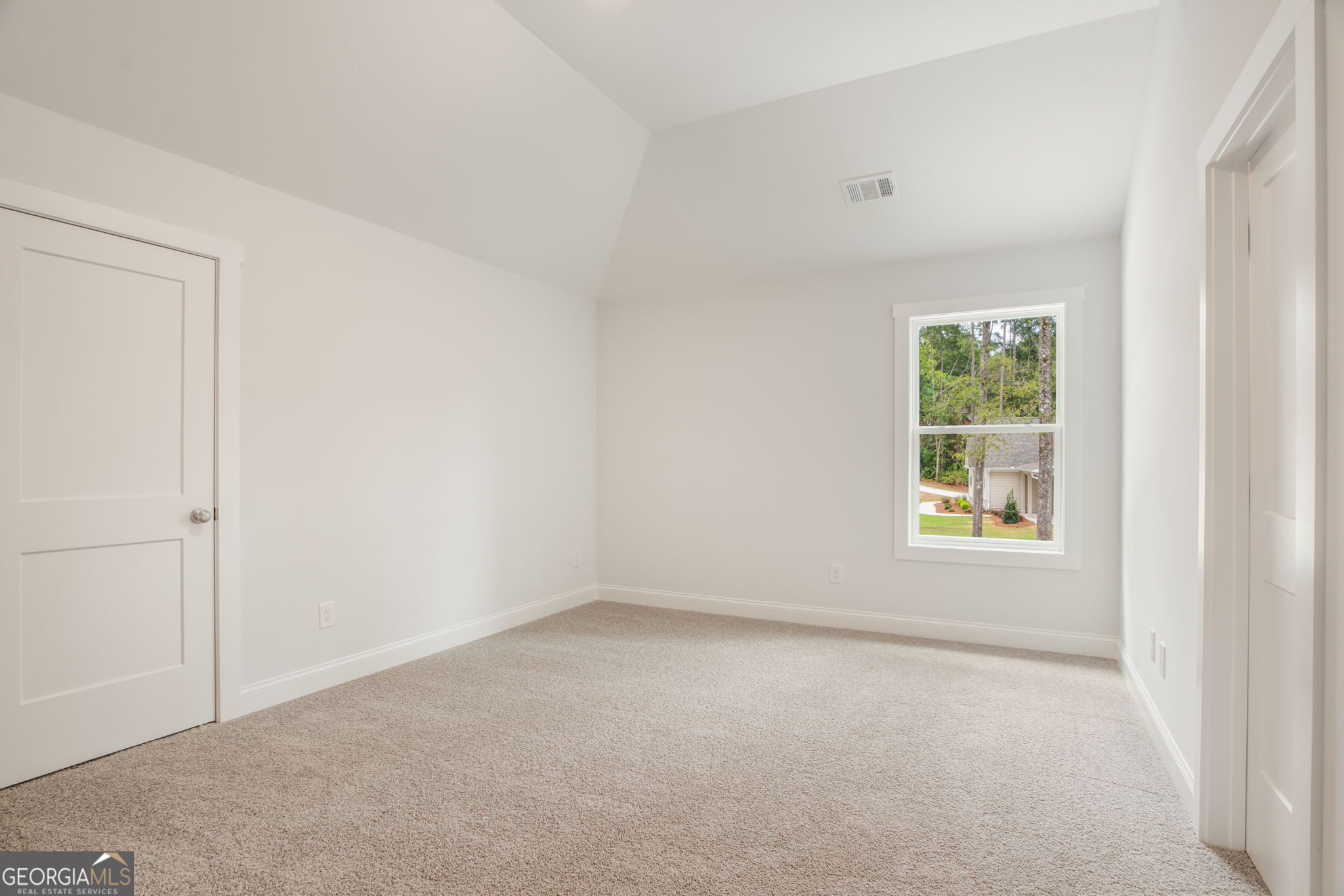 102 Mill Race Road Thomaston, GA 30286 - Photo 41 of 57 an empty room with windows