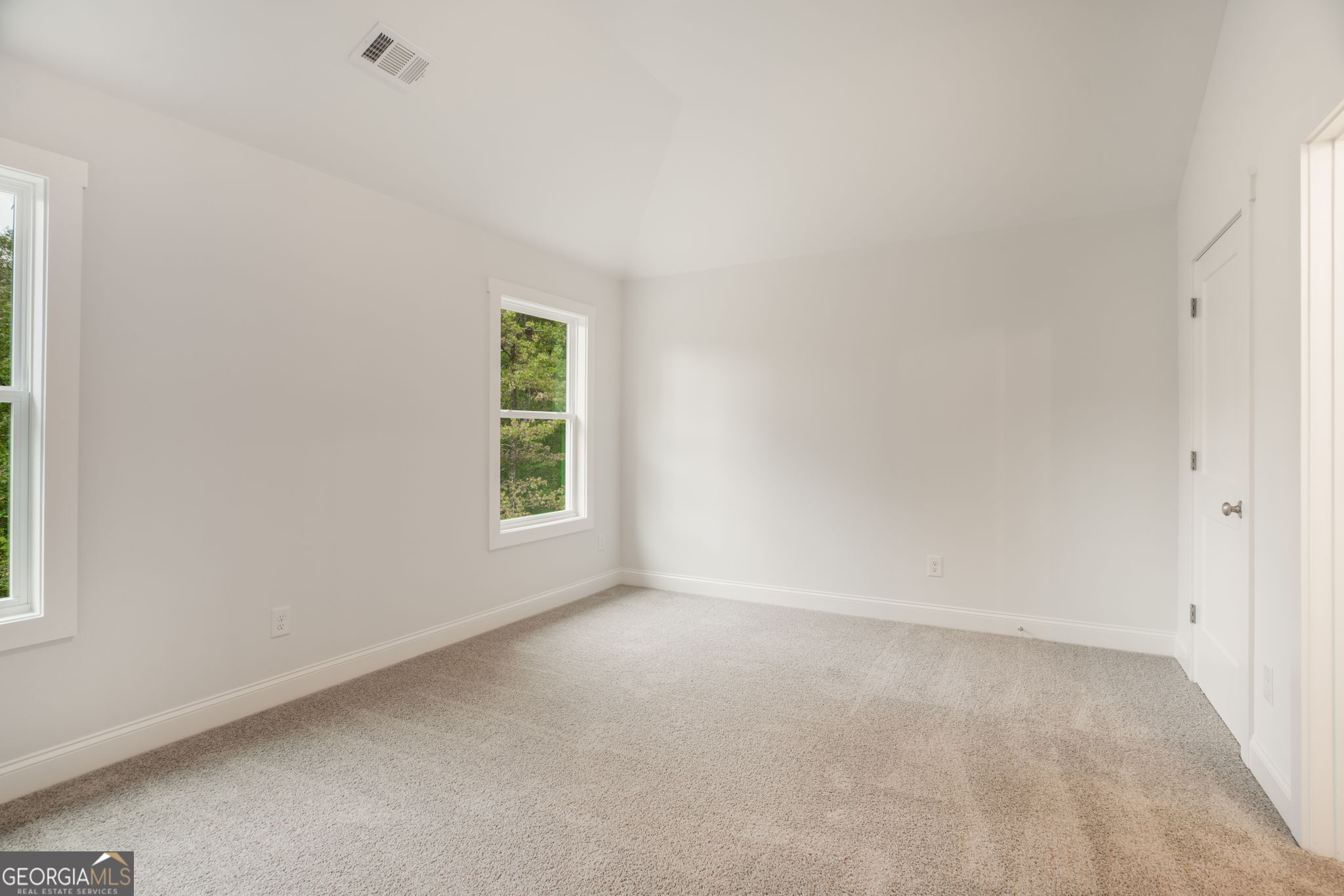 102 Mill Race Road Thomaston, GA 30286 - Photo 51 of 57 an empty room with windows