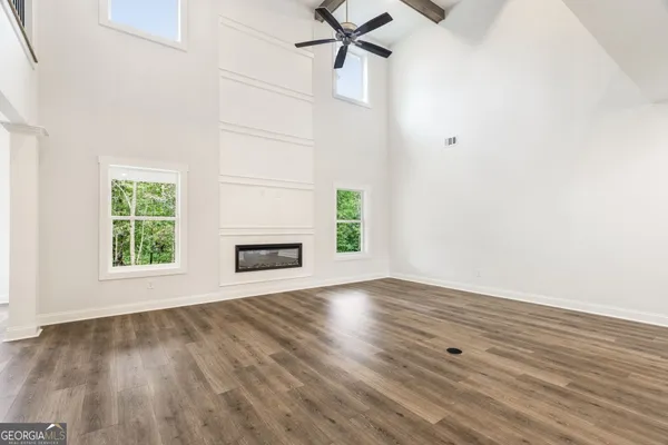a view of a kitchen and dining room