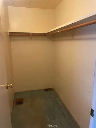 a view of a room with racks on the wall