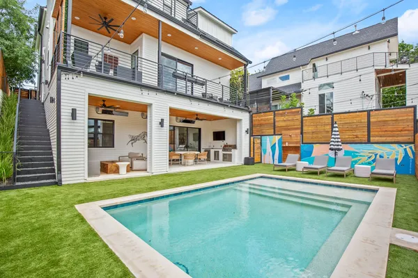 a view of an house with swimming pool