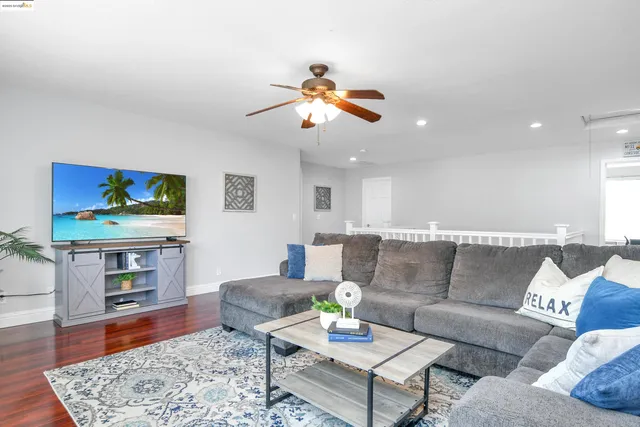 a white bath tub sitting next to a white sink