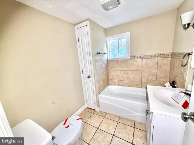 a bathroom with a sink and a bathtub