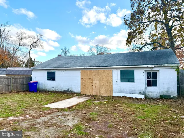 a view of a backyard with a garden