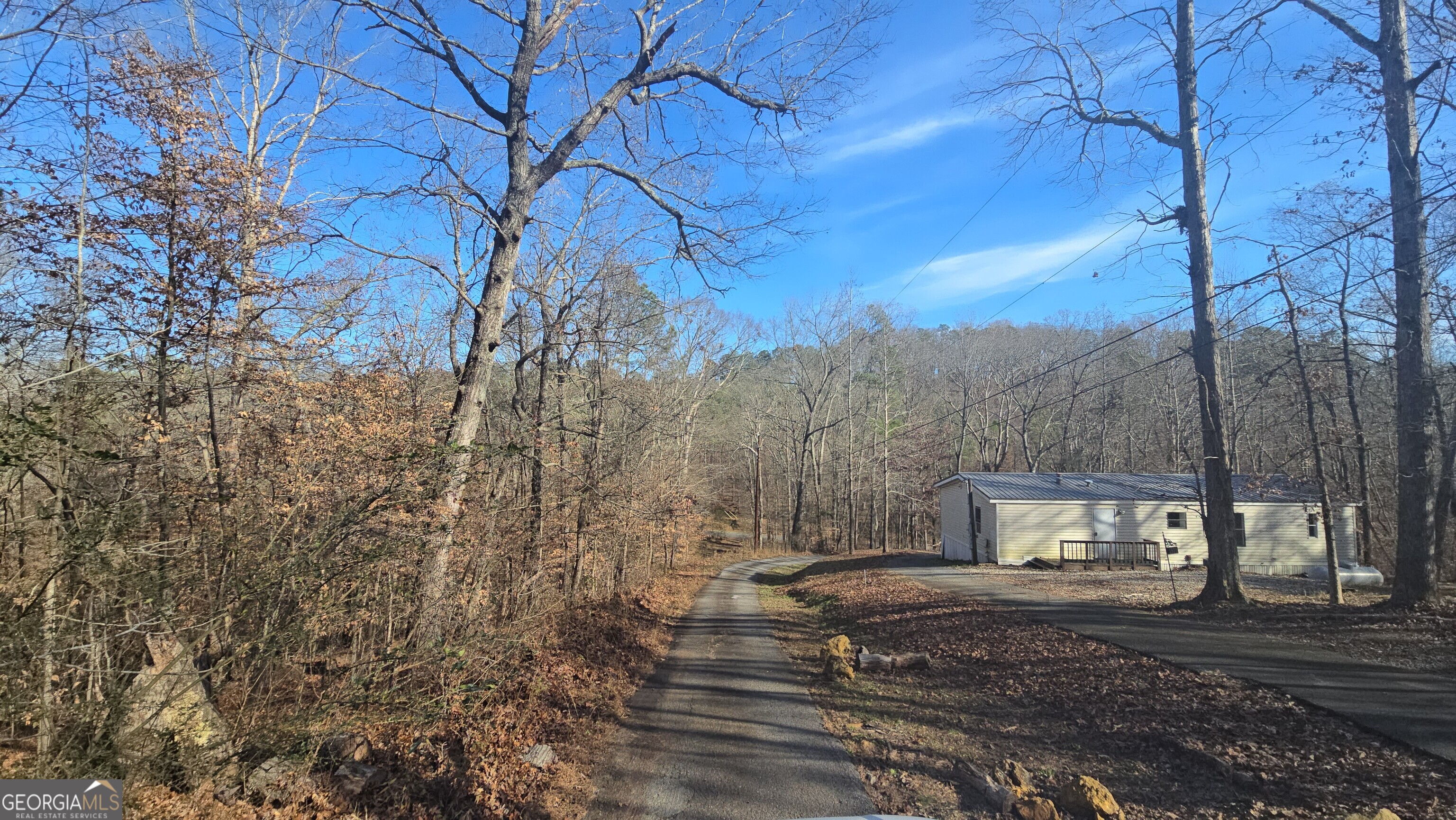 126 Puckett Road Southeast Emerson, GA 30137 - Photo 7 of 9 a view of a yard with wooden fence