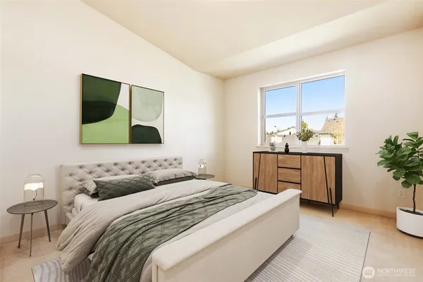 a bedroom with a bed and a dresser