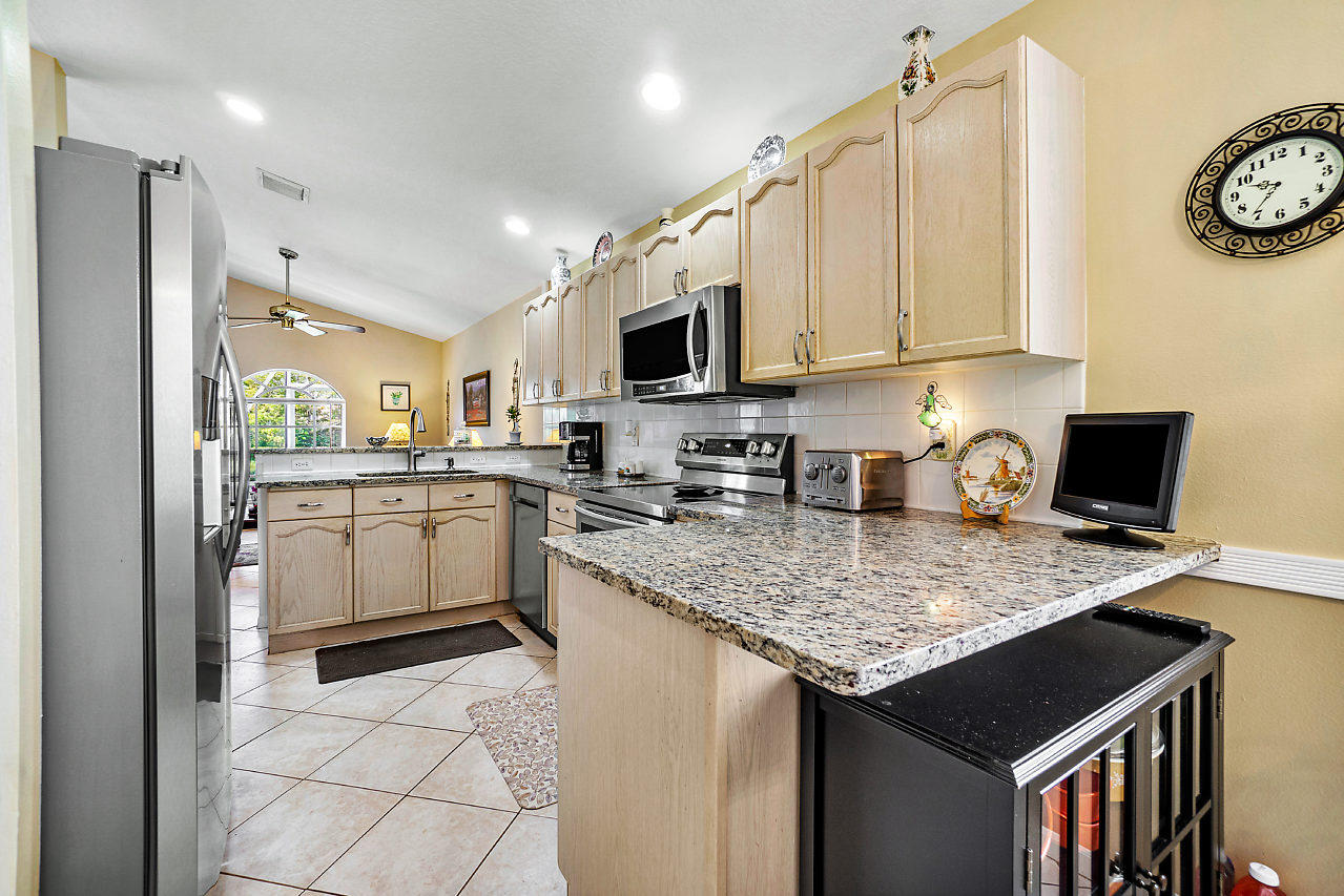 1767 Barnstable Road Wellington, FL 33414 - Photo 9 of 61 009-1767BarnstableRd-Wellington-FL-small