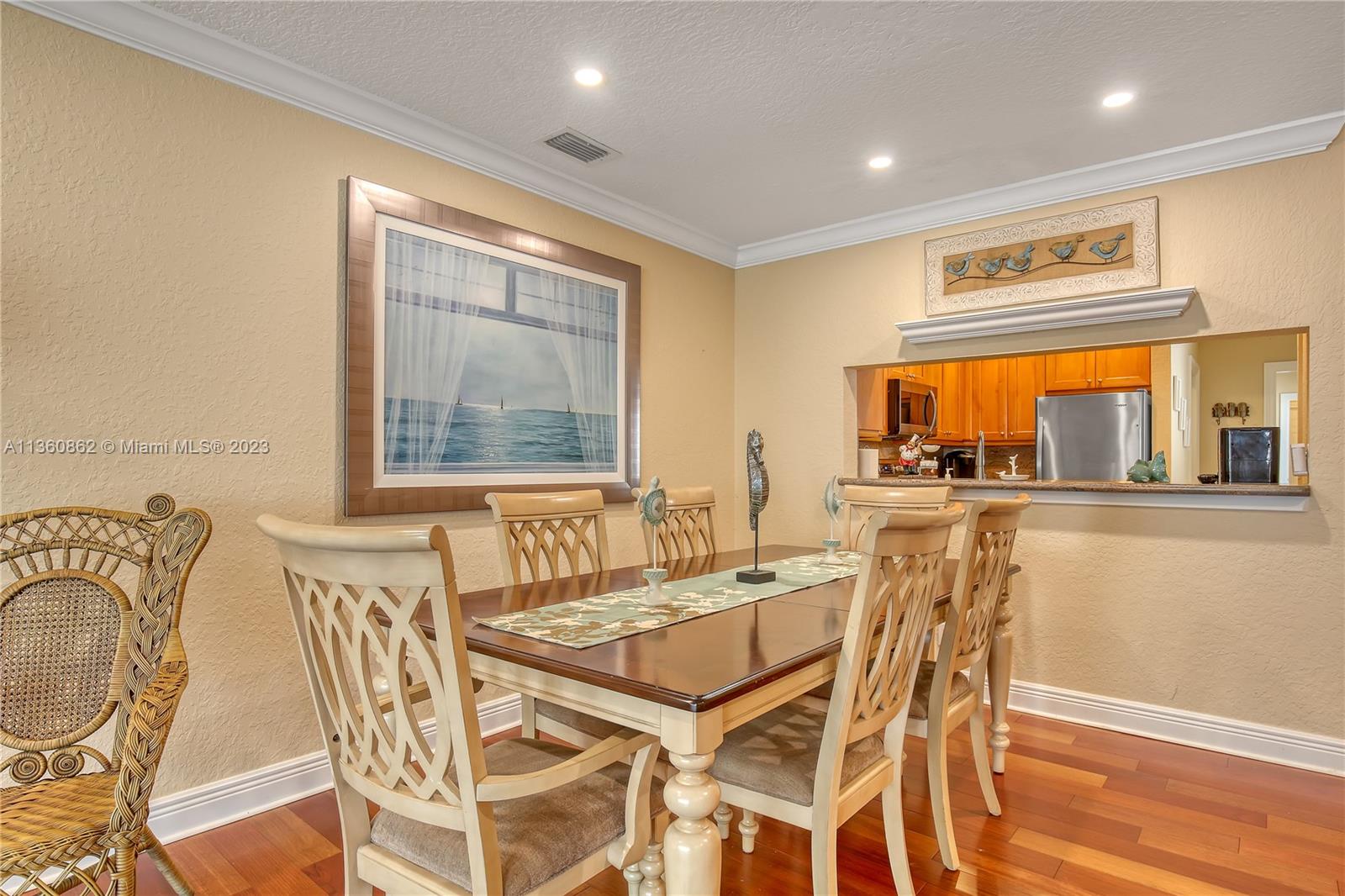 119 Ocean Dunes Circle Jupiter, FL 33477 - Photo 11 of 39 a dining room with furniture and window