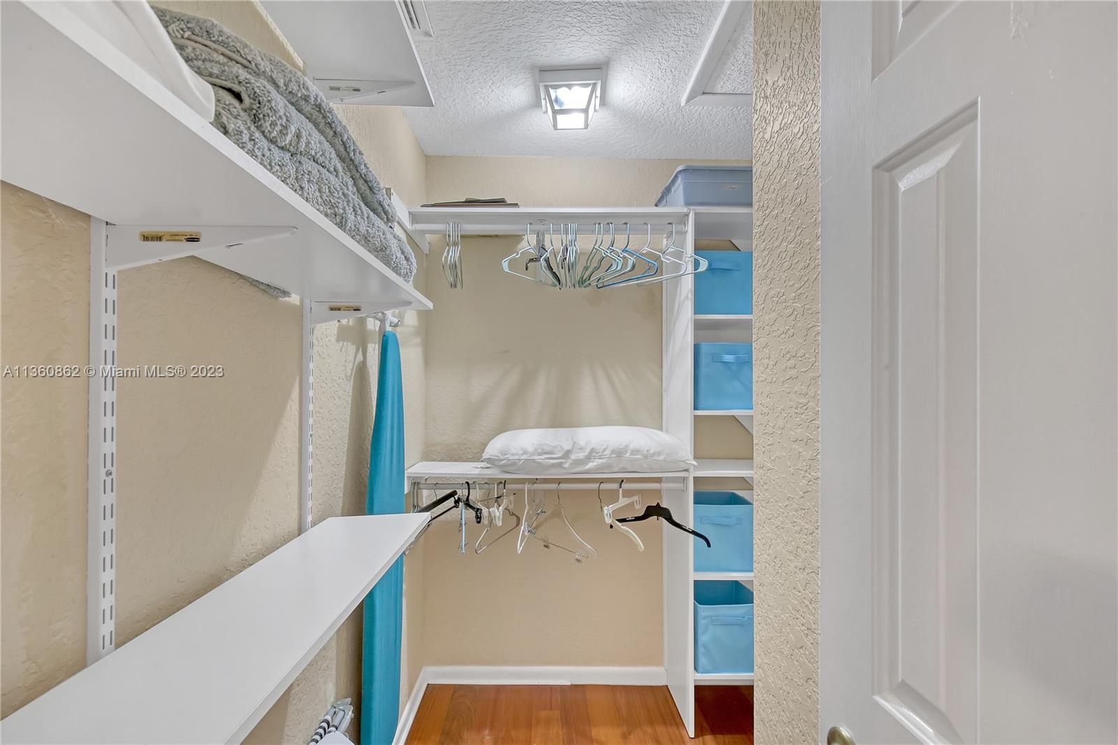 119 Ocean Dunes Circle Jupiter, FL 33477 - Photo 28 of 39 a view of a hallway with a table and chairs
