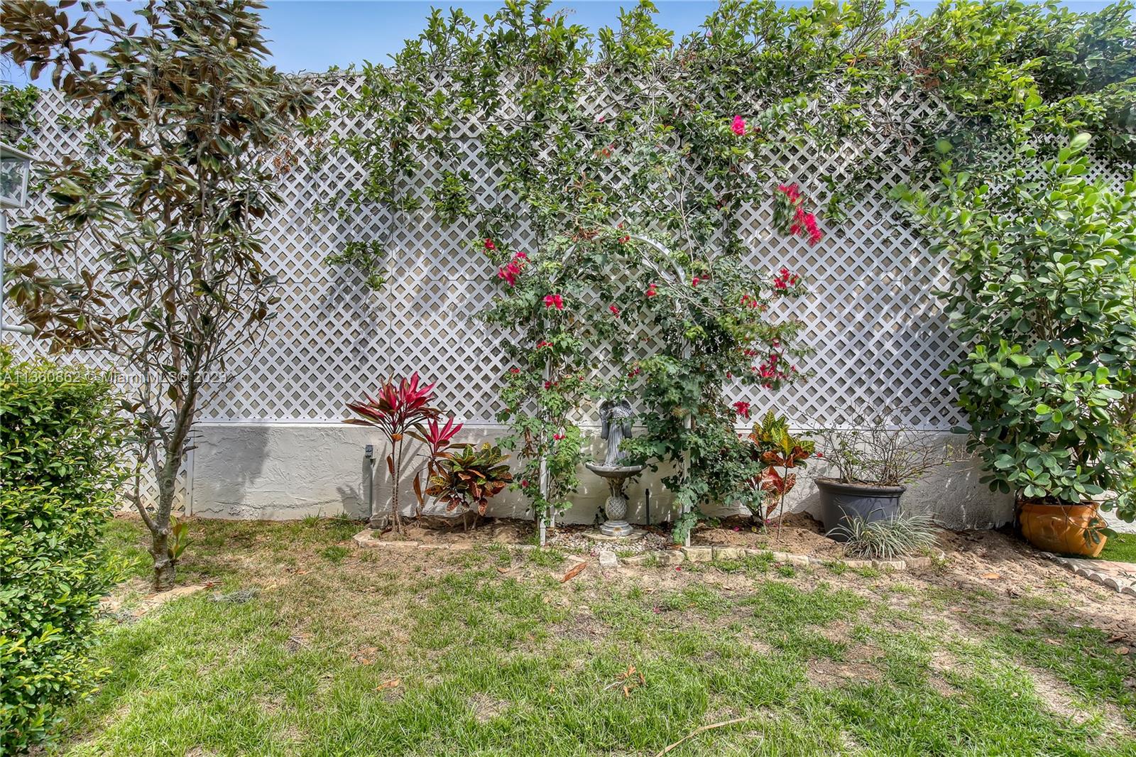 119 Ocean Dunes Circle Jupiter, FL 33477 - Photo 37 of 39 a view of a backyard