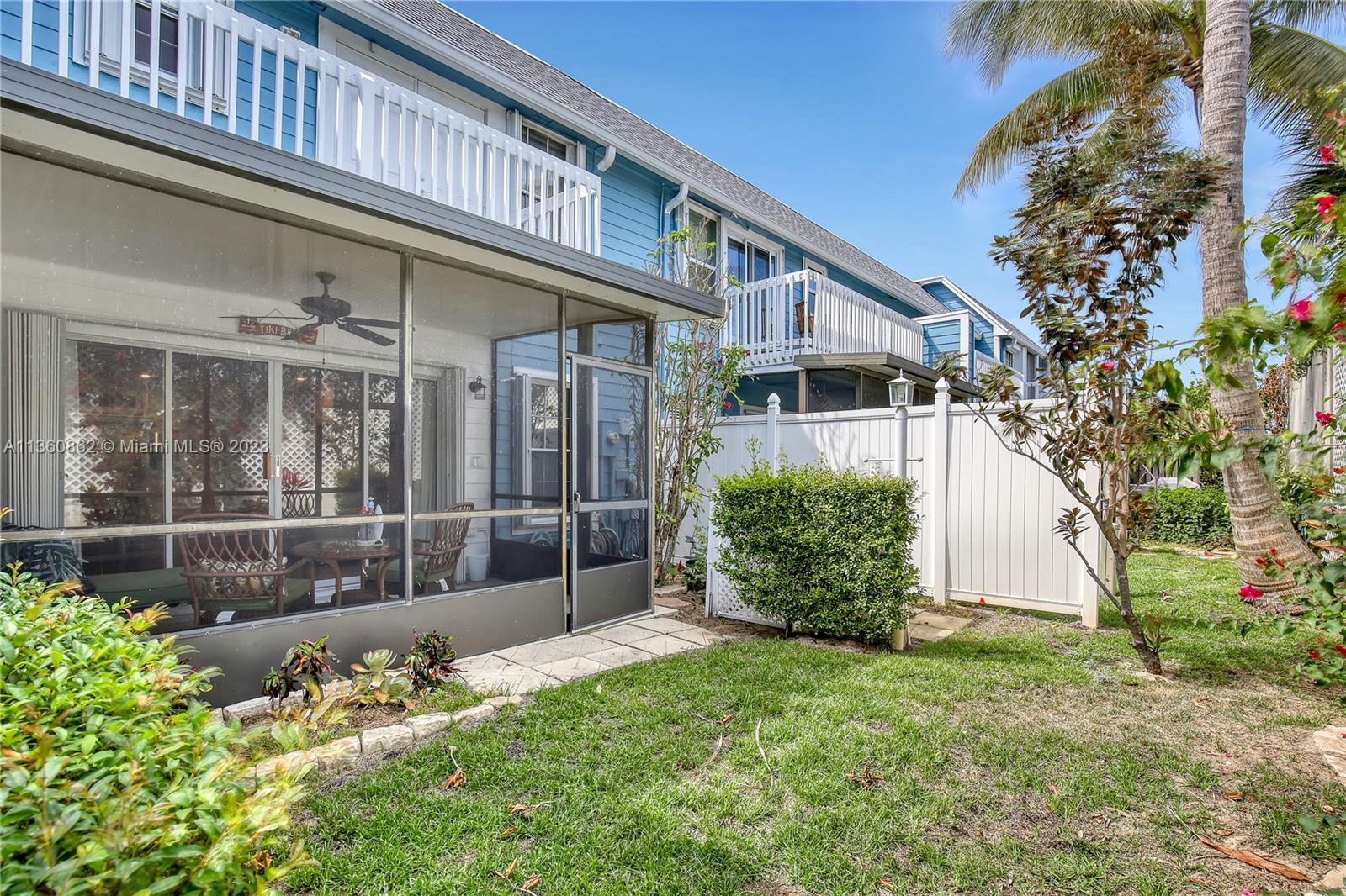 119 Ocean Dunes Circle Jupiter, FL 33477 - Photo 39 of 39 a view of a house with a yard and plants