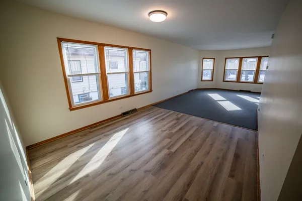 a view of an empty room and window