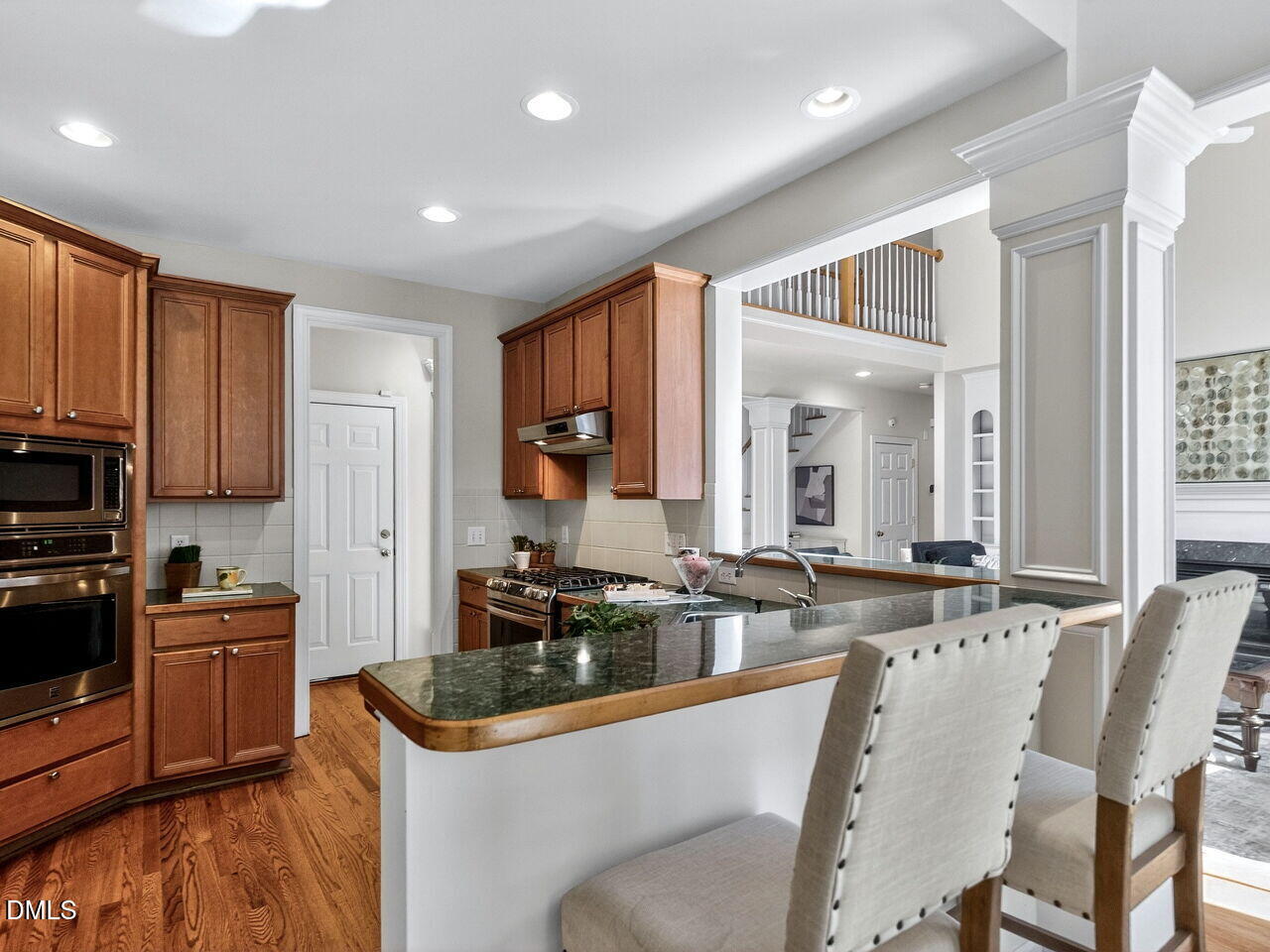 6232 Big Sandy Drive Raleigh, NC 27616 - Photo 16 of 39 a kitchen with granite countertop a sink and cabinets