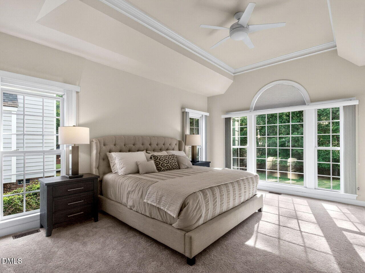 6232 Big Sandy Drive Raleigh, NC 27616 - Photo 24 of 39 a bedroom with a large bed and a large window