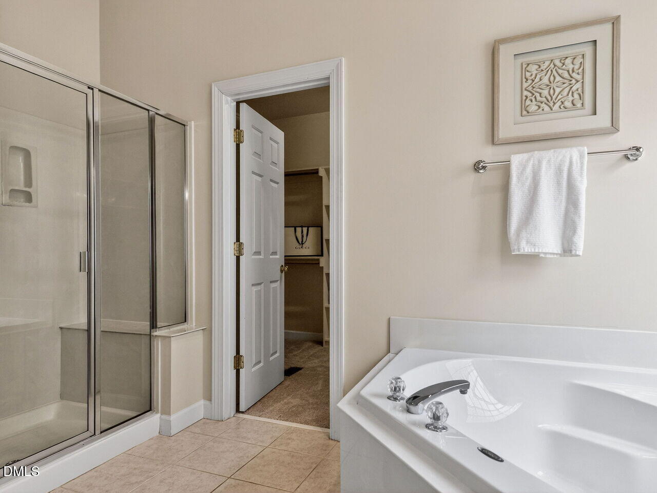 6232 Big Sandy Drive Raleigh, NC 27616 - Photo 26 of 39 a bathroom with a bathtub and shower