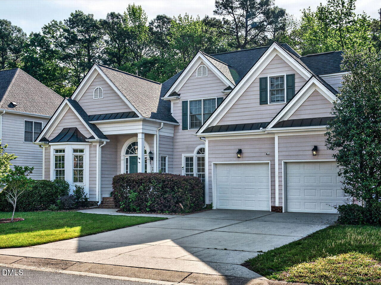 6232 Big Sandy Drive Raleigh, NC 27616 - Photo 3 of 39 a front view of a house with a yard and garage