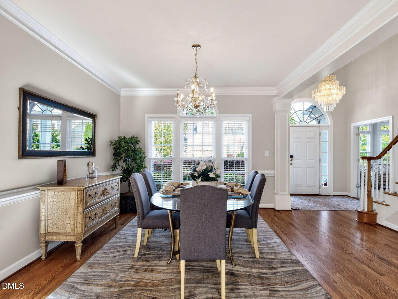 6232 Big Sandy Drive Raleigh, NC 27616 - Photo 10 of 39 a view of a dining room with furniture window and wooden floor