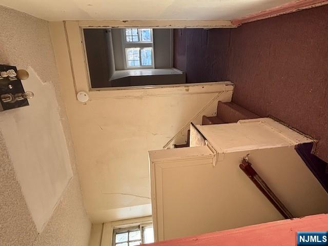 15 Albion Street Passaic, NJ 07055 - Photo 23 of 23 view of room with window and refrigerator
