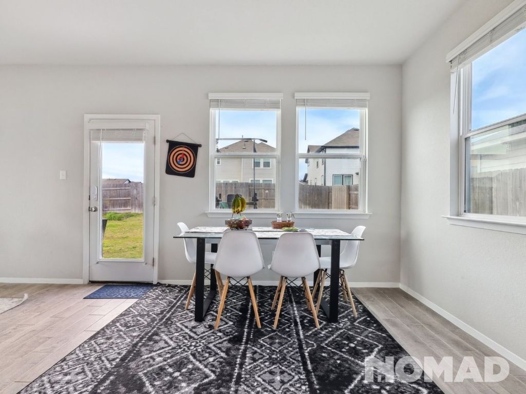 101 Crescent Street Georgetown, TX 78626 - Photo 11 of 28 a dining room with furniture and window