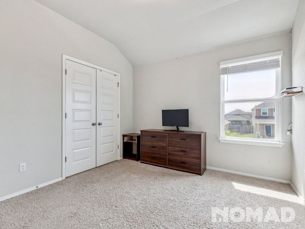101 Crescent Street Georgetown, TX 78626 - Photo 19 of 28 a view of room with furniture and windows