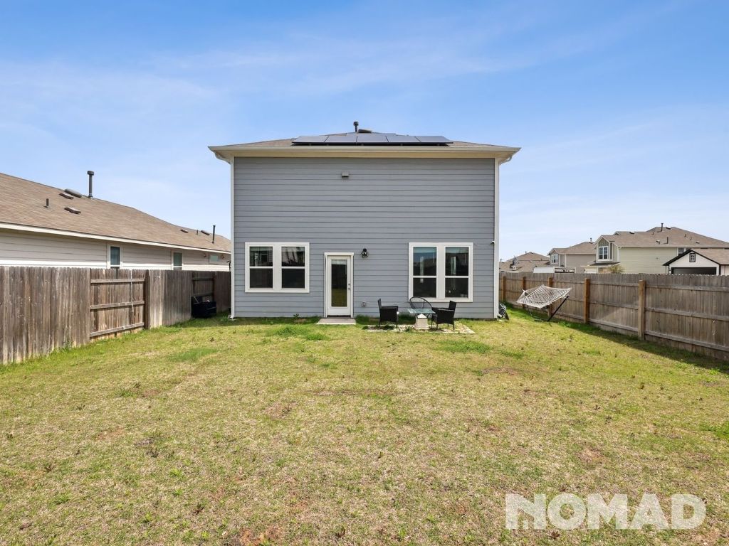 101 Crescent Street Georgetown, TX 78626 - Photo 22 of 28 a front view of a house with a garden