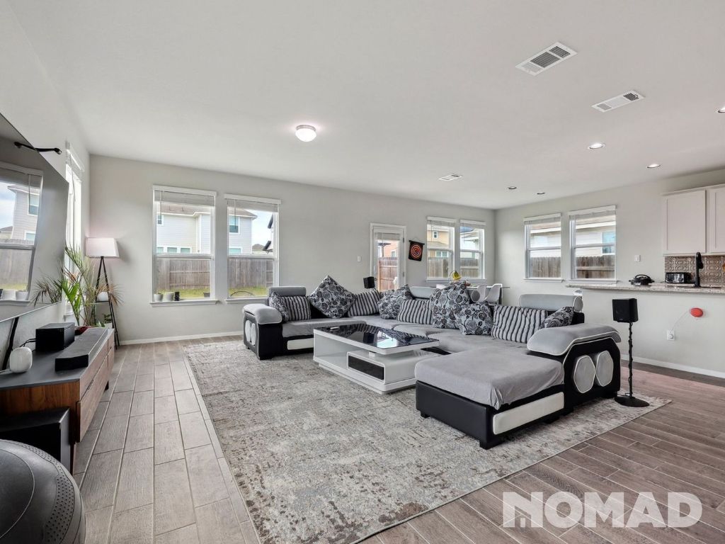 101 Crescent Street Georgetown, TX 78626 - Photo 4 of 28 a living room with furniture and wooden floor