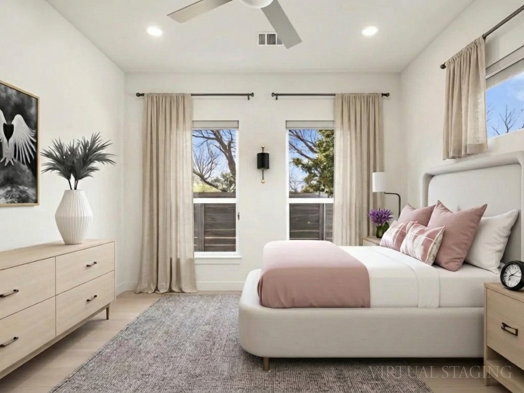 709 West St Elmo Road, Unit 2 Austin, TX 78745 - Photo 12 of 26 Bedroom featuring light wood finished floors, recessed lighting, and a ceiling fan