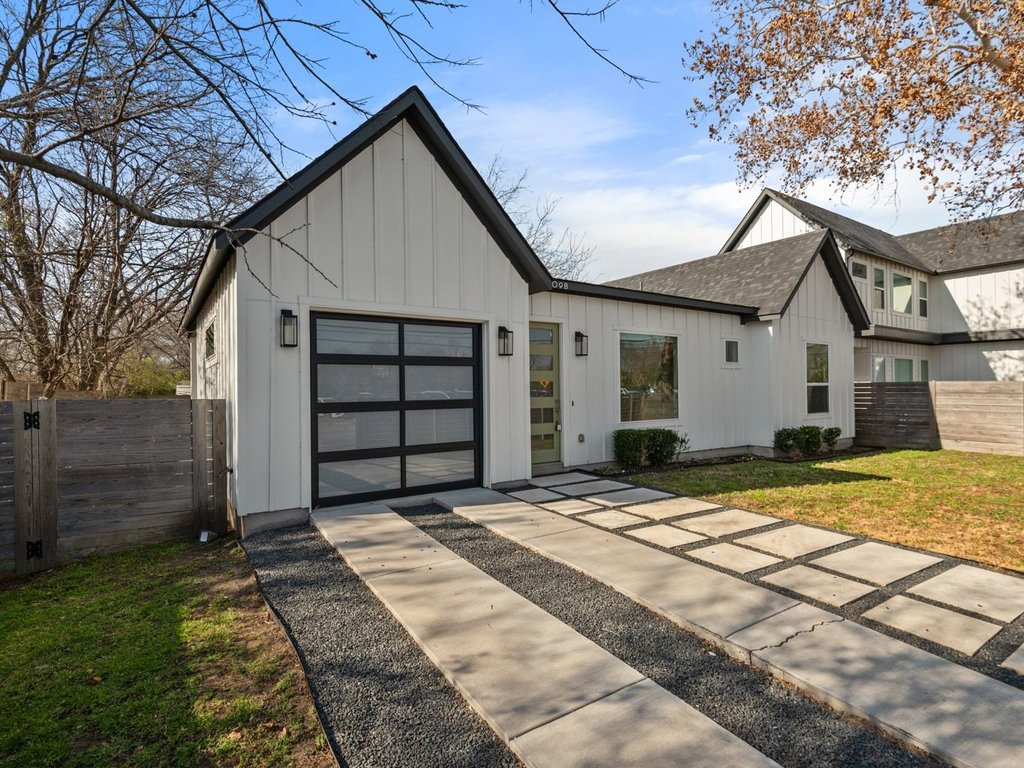 709 West St Elmo Road, Unit 2 Austin, TX 78745 - Photo 4 of 26 Modern farmhouse with driveway and board and batten siding