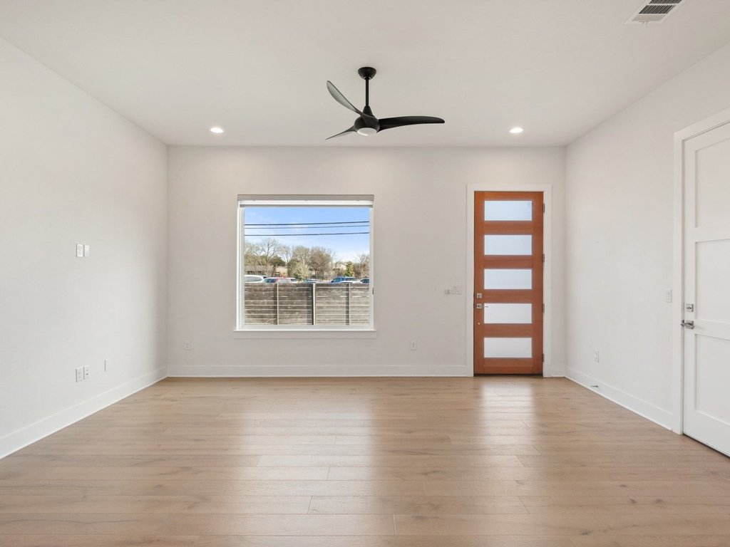 709 West St Elmo Road, Unit 2 Austin, TX 78745 - Photo 6 of 26 Entryway featuring ceiling fan, light wood finished floors, and recessed lighting