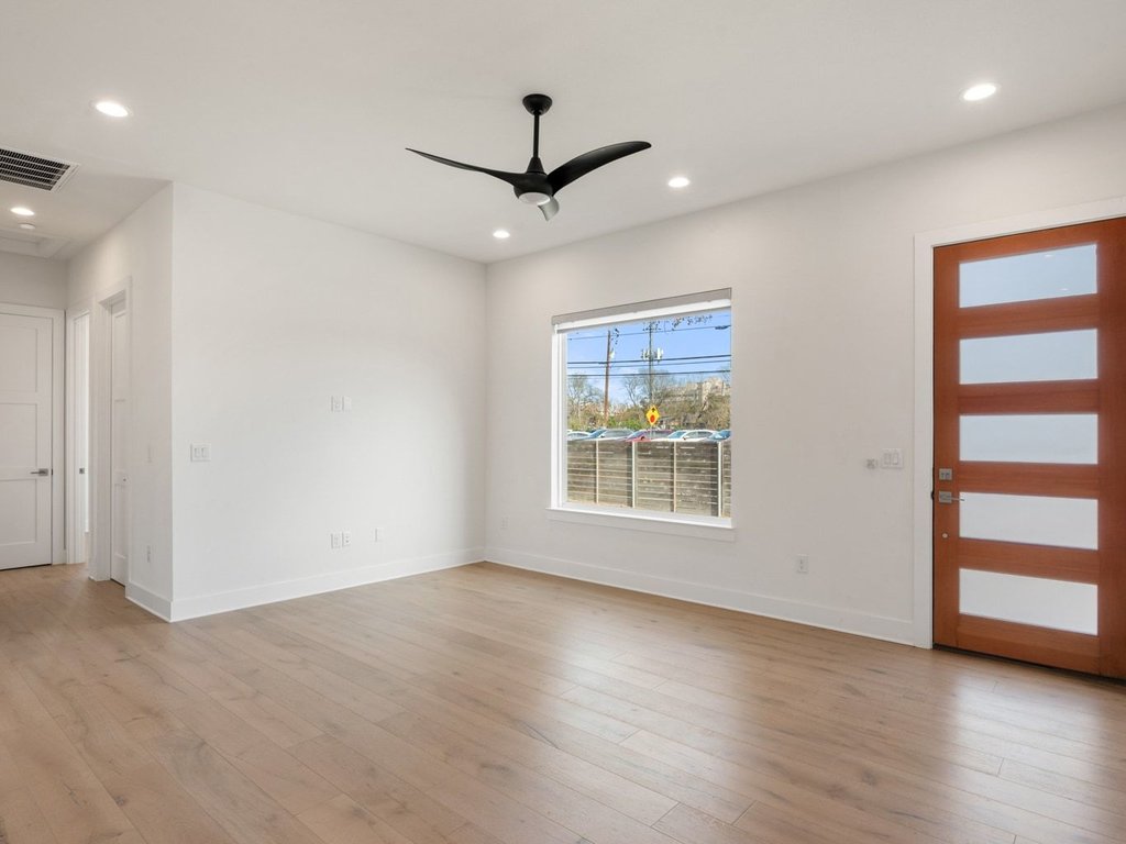 709 West St Elmo Road, Unit 2 Austin, TX 78745 - Photo 7 of 26 Foyer with a ceiling fan, light wood finished floors, and recessed lighting