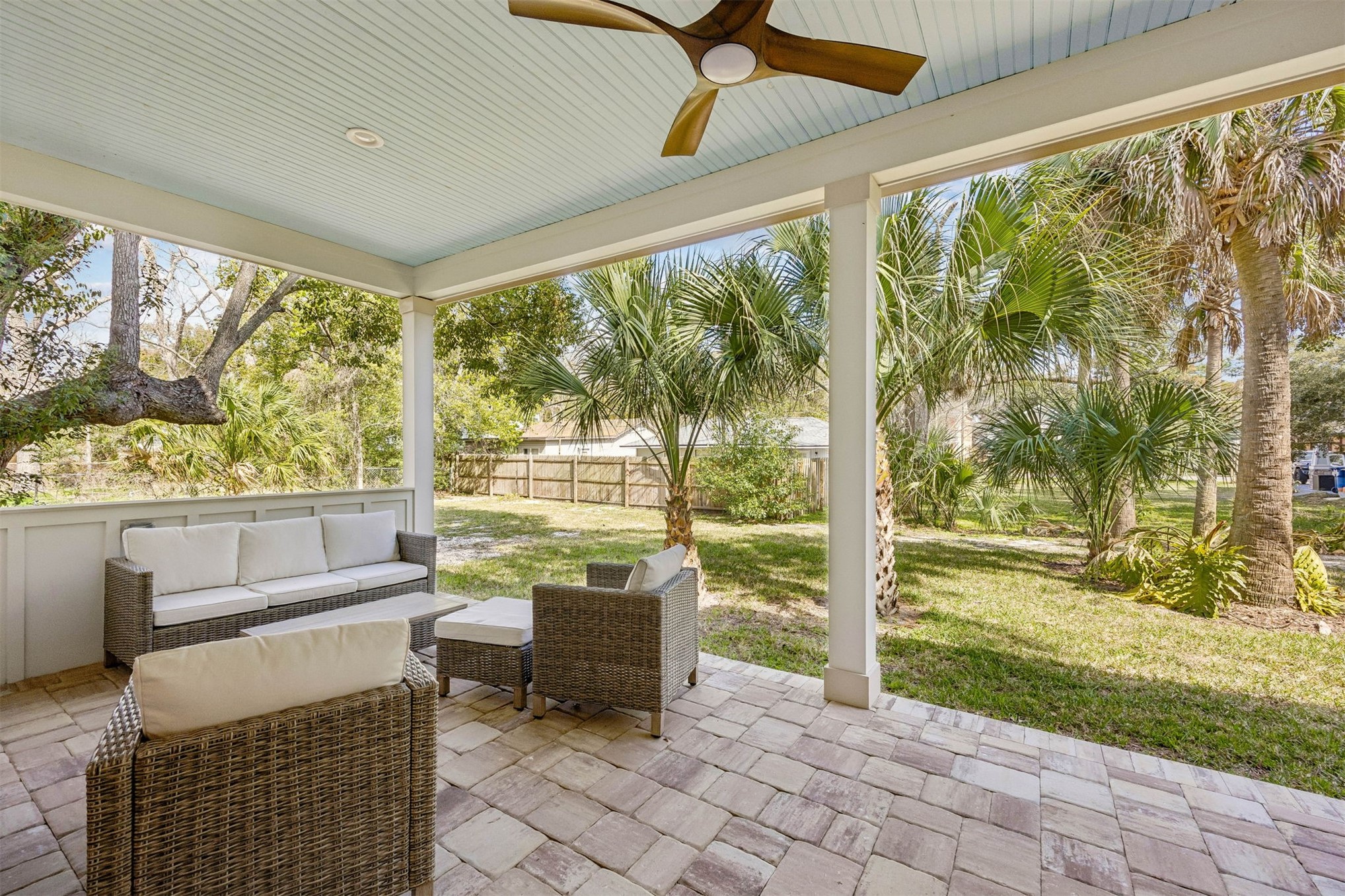 424 South 3rd Street Fernandina Beach, FL 32034 - Photo 32 of 38 a living room with patio furniture and garden view