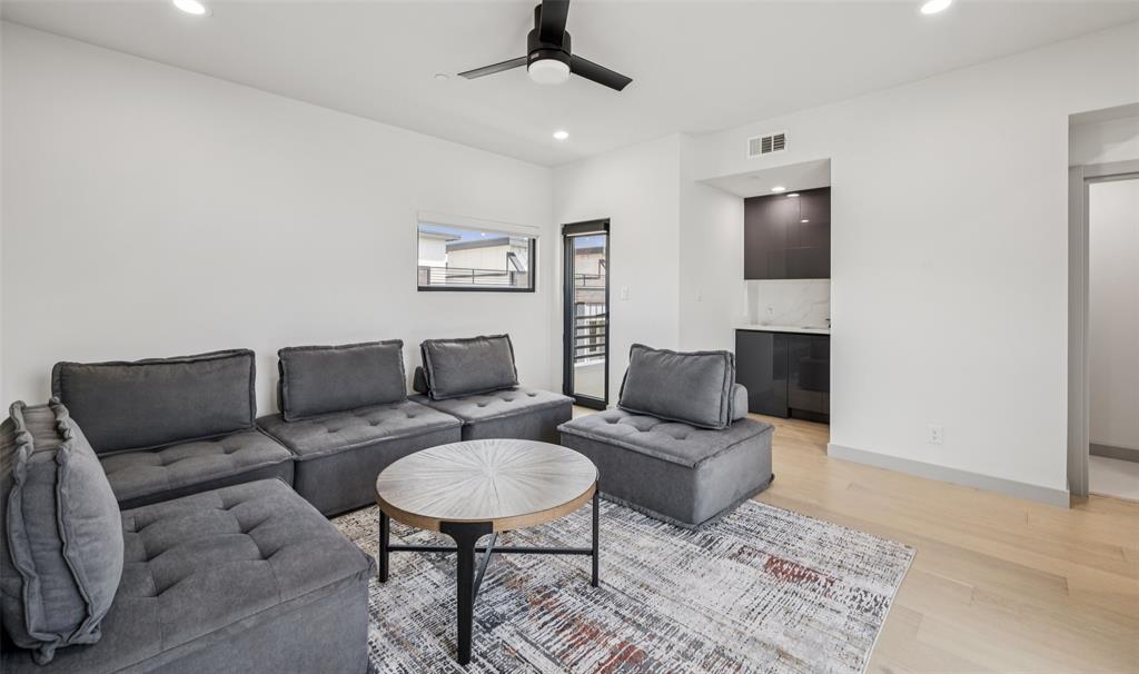1874 Beaumont Street Dallas, TX 75215 - Photo 29 of 38 a living room with furniture and a rug