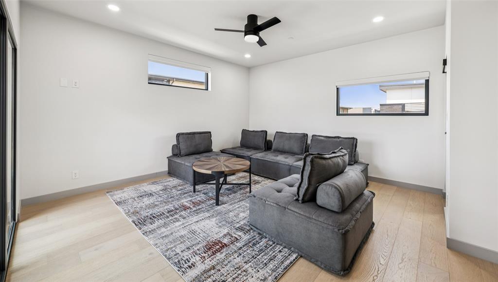 1874 Beaumont Street Dallas, TX 75215 - Photo 30 of 38 a living room with furniture and a rug