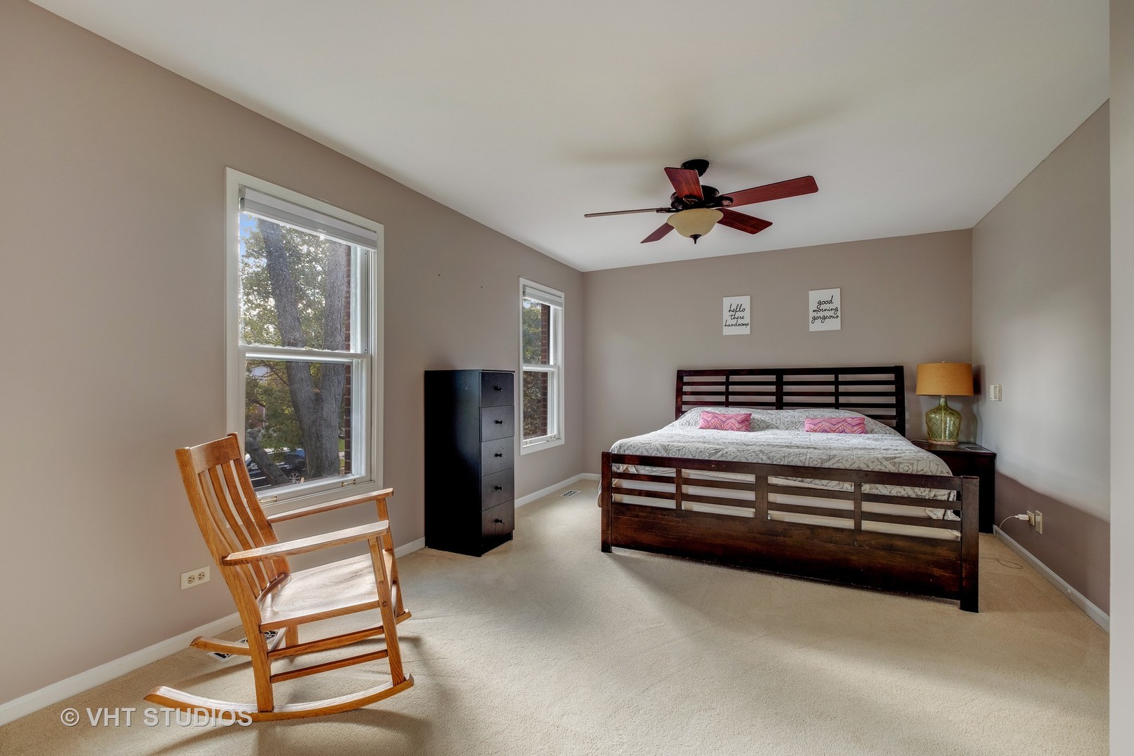 9054 Forestview Road Evanston, IL 60203 - Photo 11 of 24 a bedroom with a bed and a ceiling fan