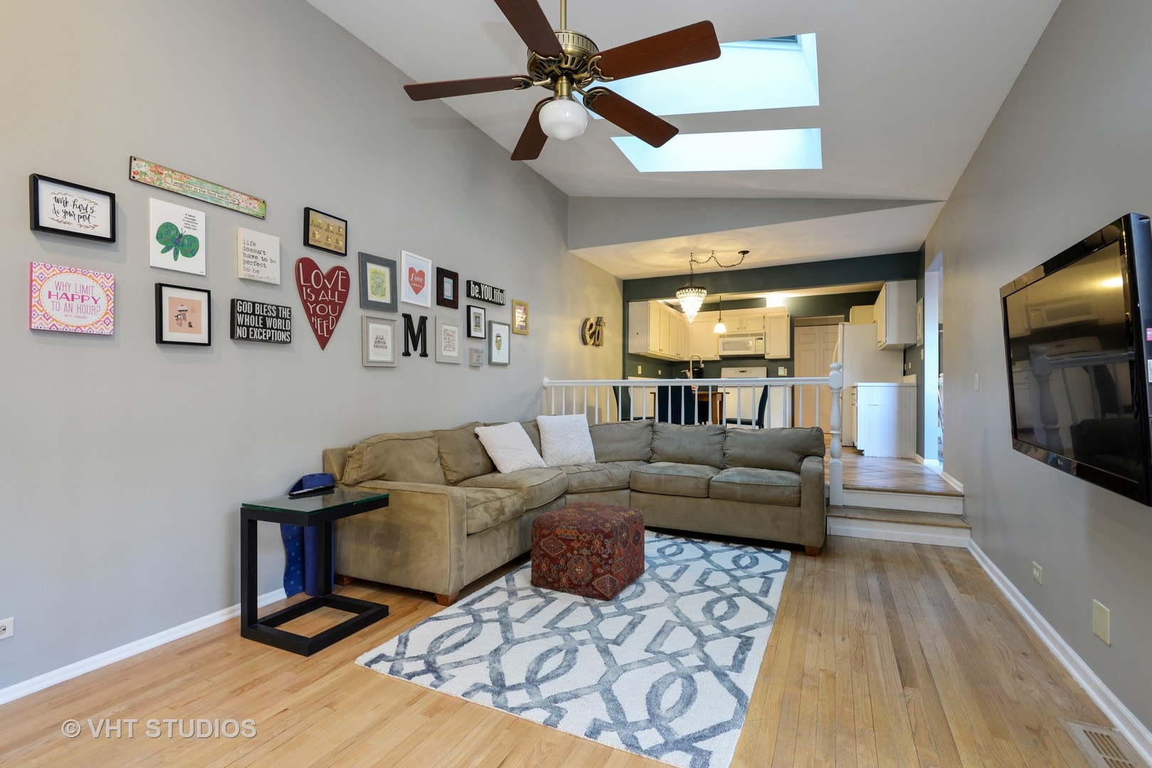 9054 Forestview Road Evanston, IL 60203 - Photo 10 of 24 a living room with furniture and a flat screen tv