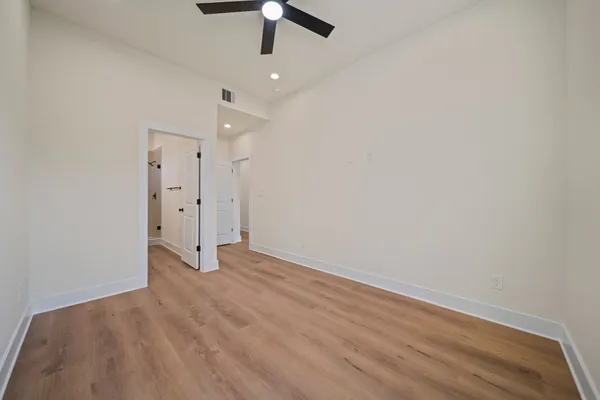 a view of kitchen with wooden floor and window