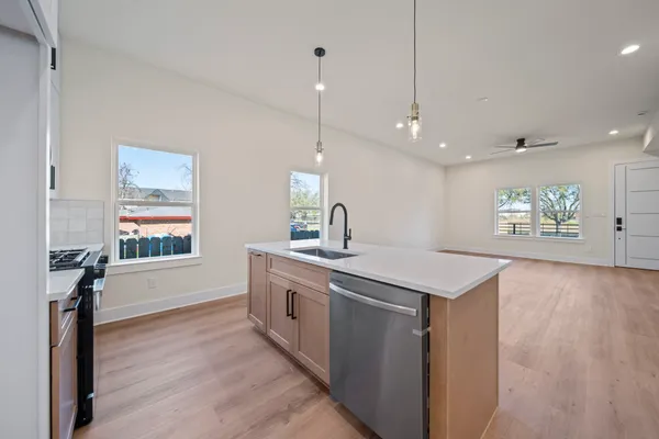 a bathroom with a double vanity sink toilet mirror and shower
