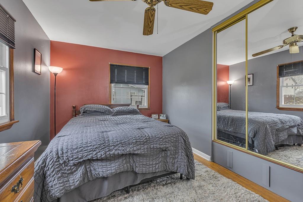 161 Maple Drive Beaver, PA 15009 - Photo 13 of 29 a bedroom with a large bed and a chandelier