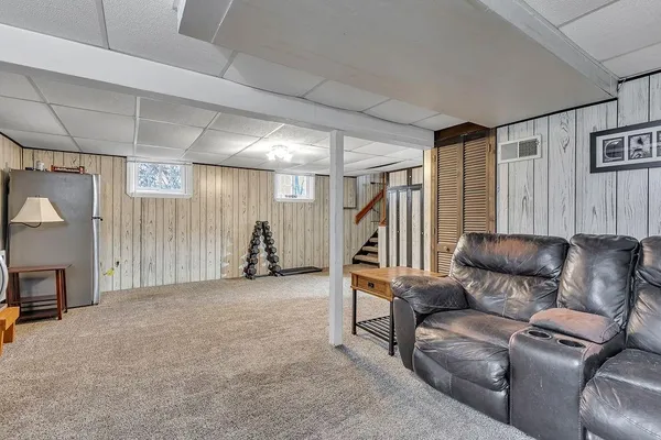 a view of a livingroom with furniture and a couch