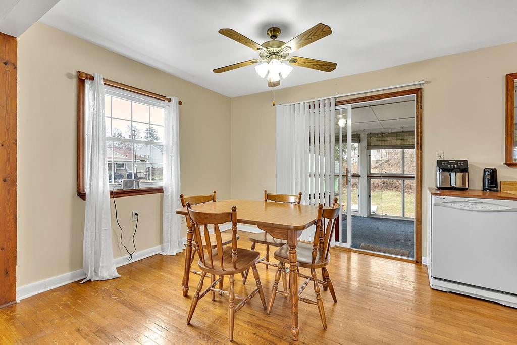 161 Maple Drive Beaver, PA 15009 - Photo 7 of 29 a view of a dining room with furniture window and wooden floor