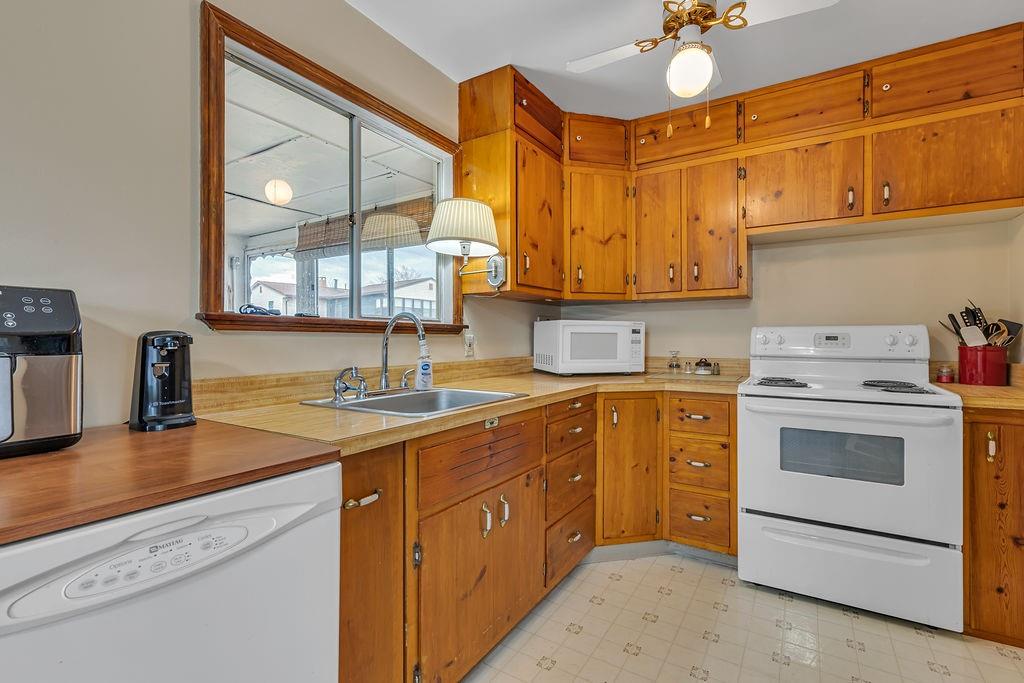 161 Maple Drive Beaver, PA 15009 - Photo 9 of 29 a kitchen with a sink cabinets and appliances