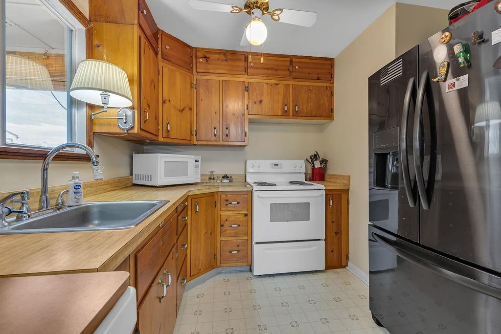 161 Maple Drive Beaver, PA 15009 - Photo 10 of 29 a kitchen with a sink cabinets and stainless steel appliances