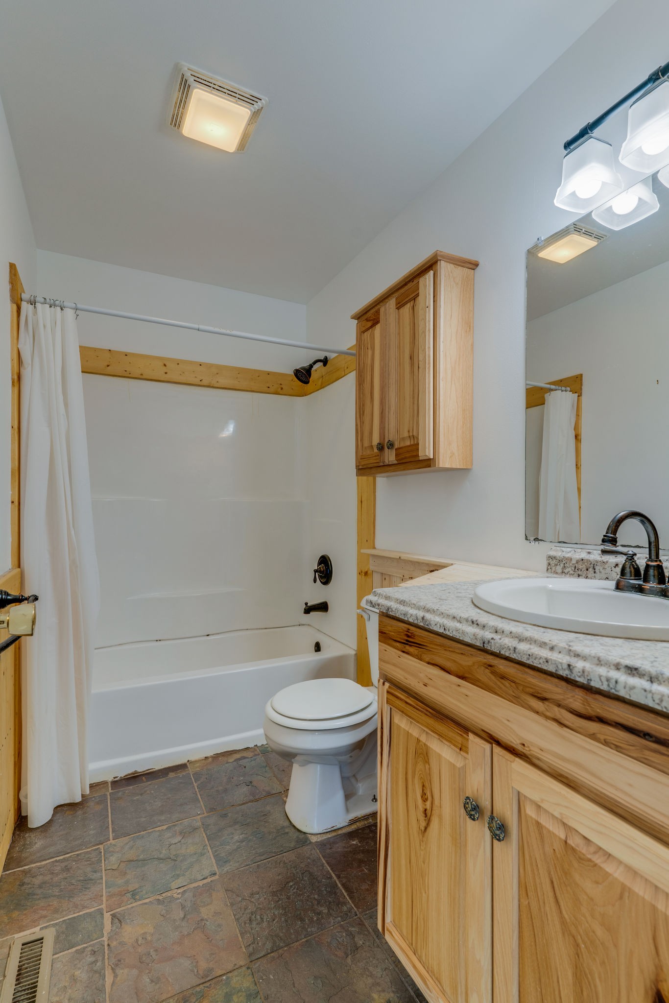 4614 Woodrow Wilson Road Springfield, TN 37172 - Photo 16 of 29 a bathroom with a sink a toilet and shower