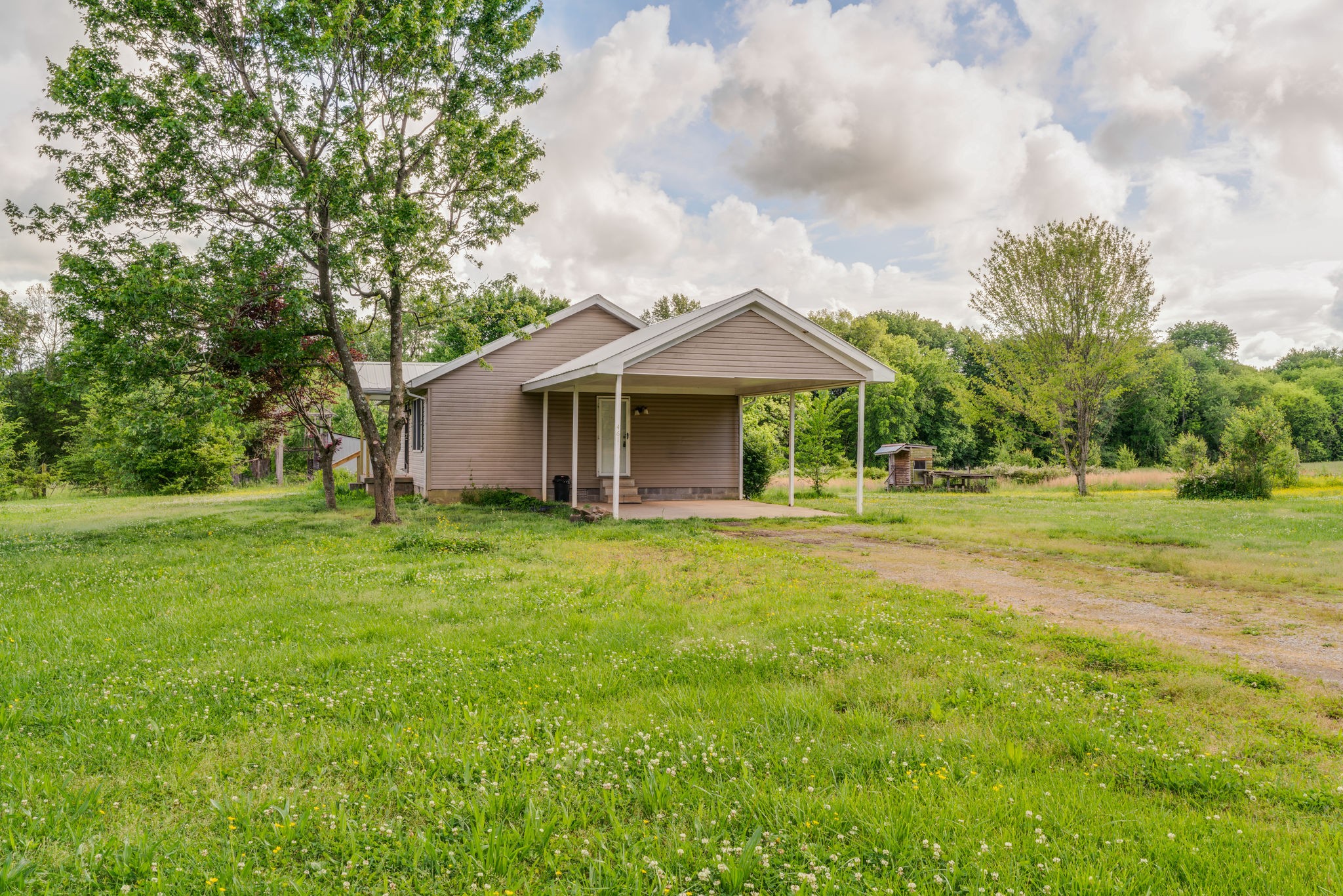 4614 Woodrow Wilson Road Springfield, TN 37172 - Photo 3 of 29 a front view of a house with a yard