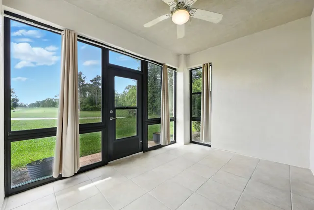 a view of an entryway with a garden