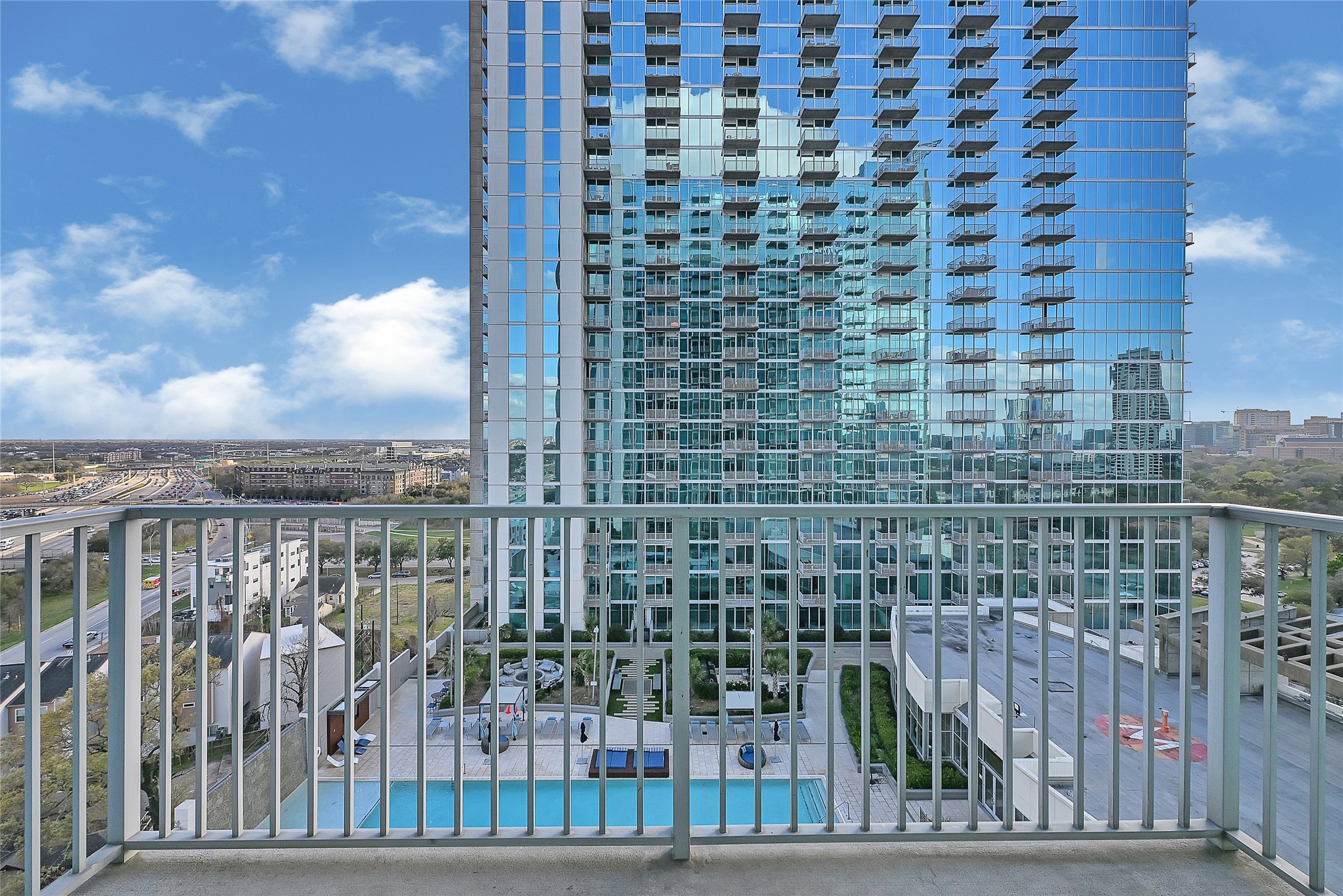 5925 Almeda Road, Unit 11306 Houston, TX 77004 - Photo 3 of 32 a view of a balcony with a door